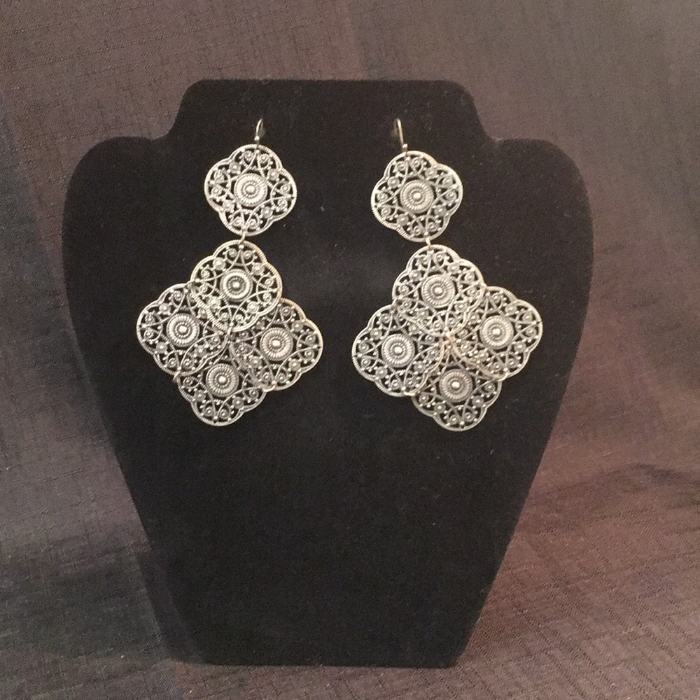 Silver toned earrings large boho details